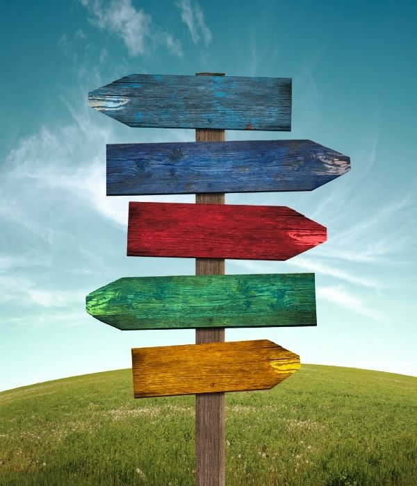 A montage of dozens of pictures of people's heads covered by a blurred circle.