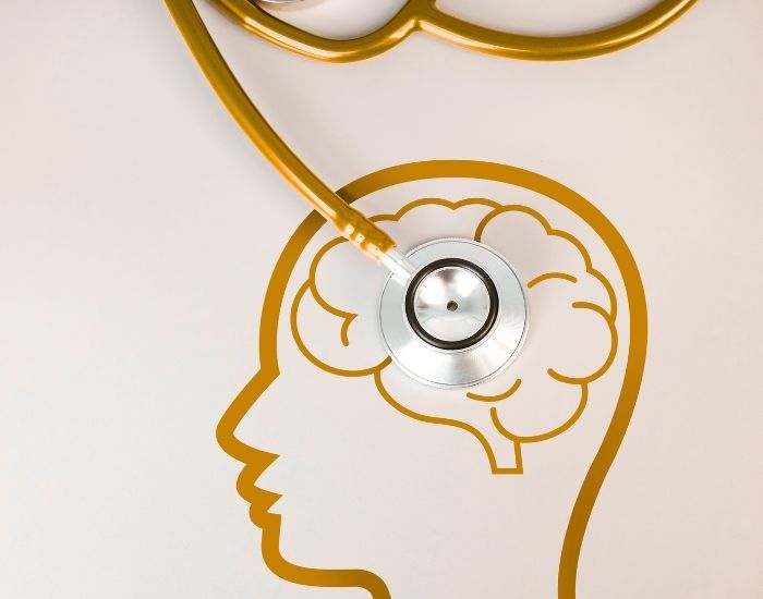 Red yield sign with an exclamation point amid a rainy sky background.