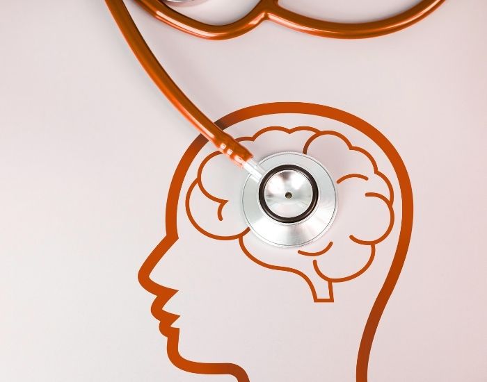 Red yield sign with an exclamation point amid a rainy sky background.